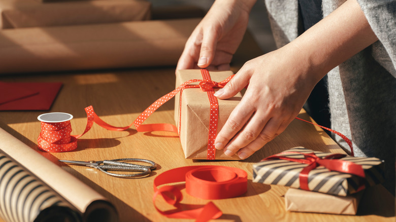 Someone wrapping gifts