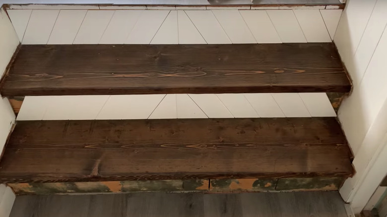 partially completed shiplap stair risers