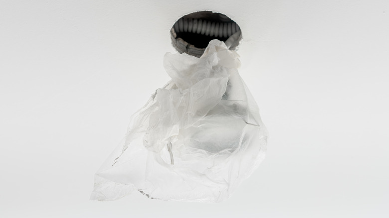 ceiling light fixture inside plastic bag