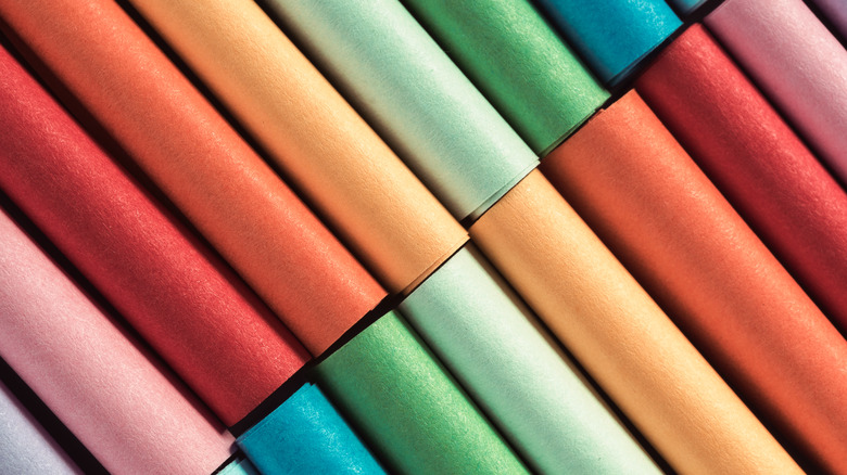 Assorted rolls of colorful paper