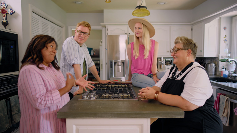 Katarina Blom, Ella Engström, and Johan Svenson working with Flora Haug