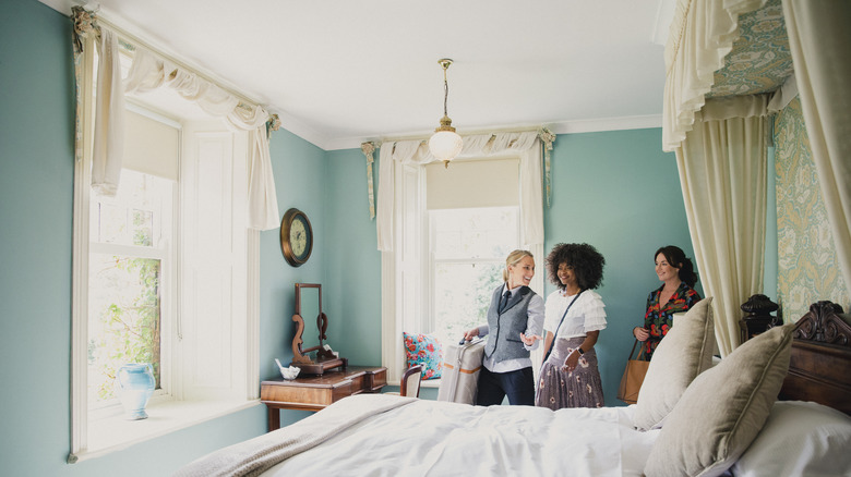 Guests in blue-themed room