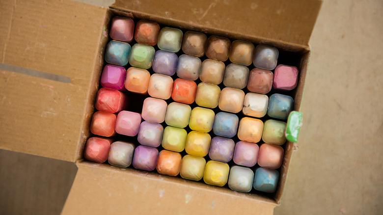 Box of colorful sidewalk chalk