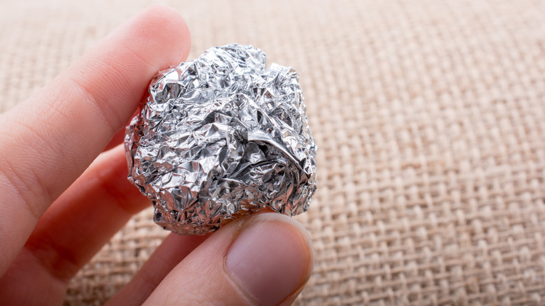 Balled up aluminum foil 