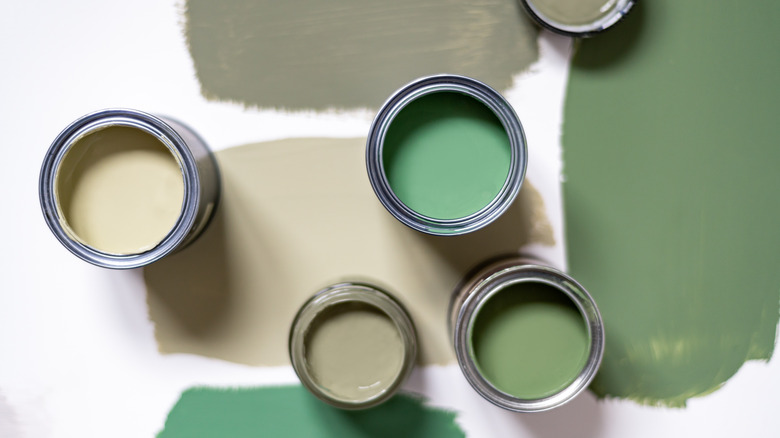 Green and neutral paint cans