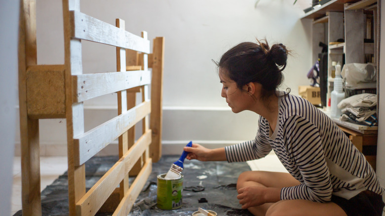 woman with wood pallet