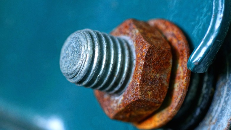 nut rusted onto bolt