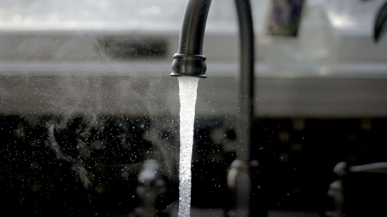 faucet running water in sink