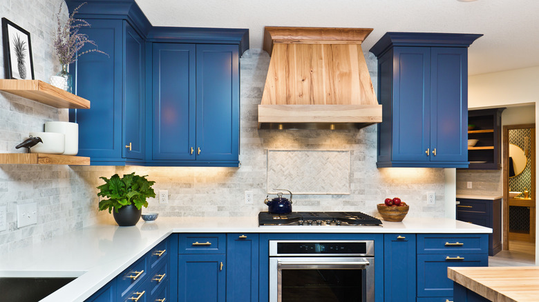 Kitchen with blue cabinets