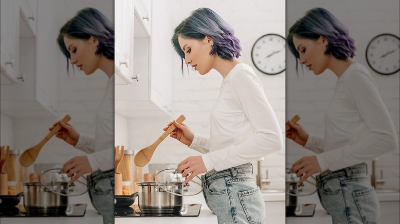 Person cooking in kitchen