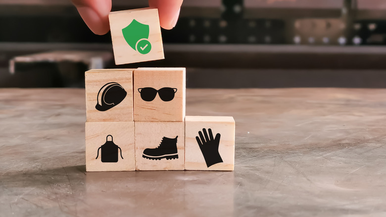 safety symbols on wood blocks