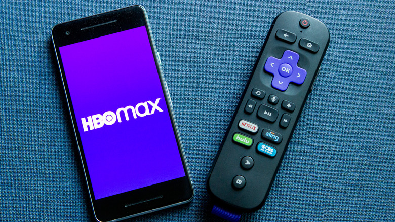 roku remote next to smartphone