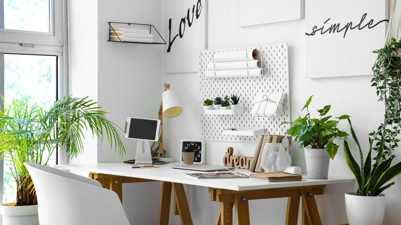 home office desk with pegboard