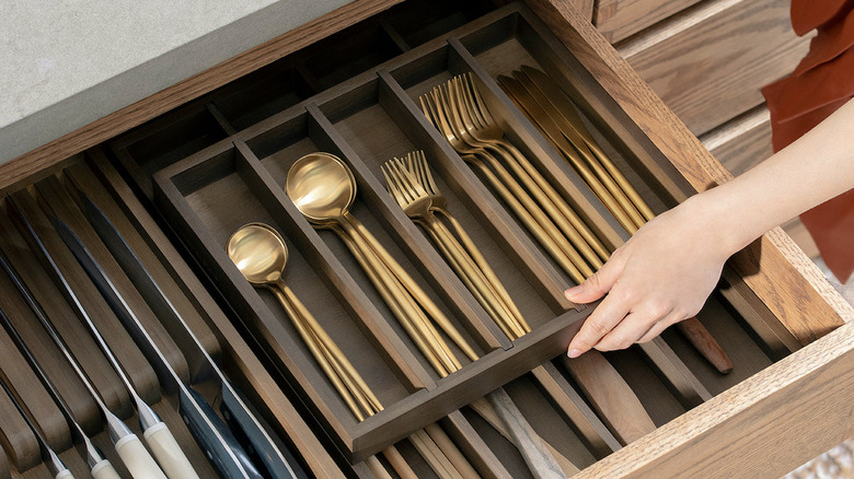 organized utensils in drawer