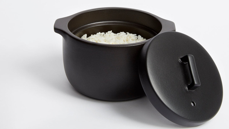 rice inside black ceramic pot