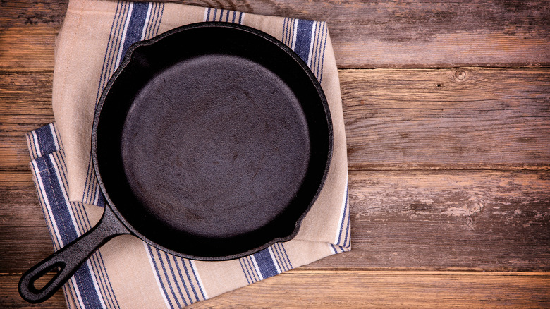 Cast iron pan on towel