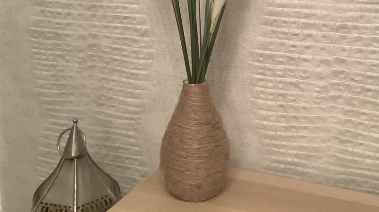 A gold textured vase from DIY hot glue hack