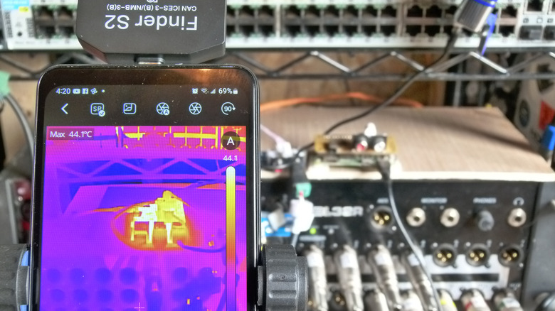 A Raspberry Pi and audio rack equipment viewed through the lens of a Finder S2 thermal imager