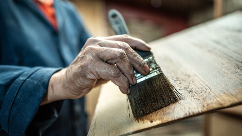 A person working on a woodworking project