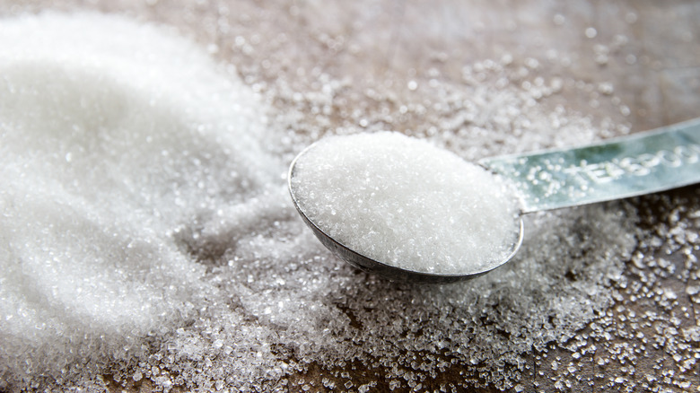 granulated sugar on a spoon