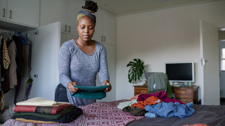 woman organizing clothes