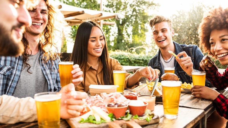 people enjoying summer cocktails