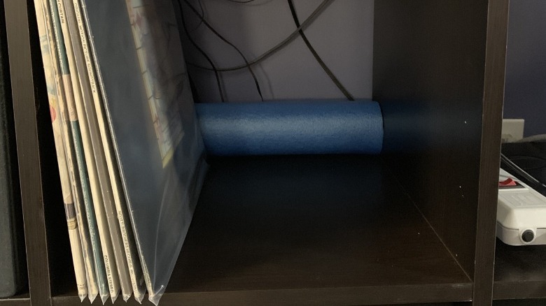 pool noodle at the back of the shelf