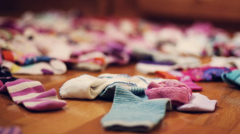 disorganized socks on floor