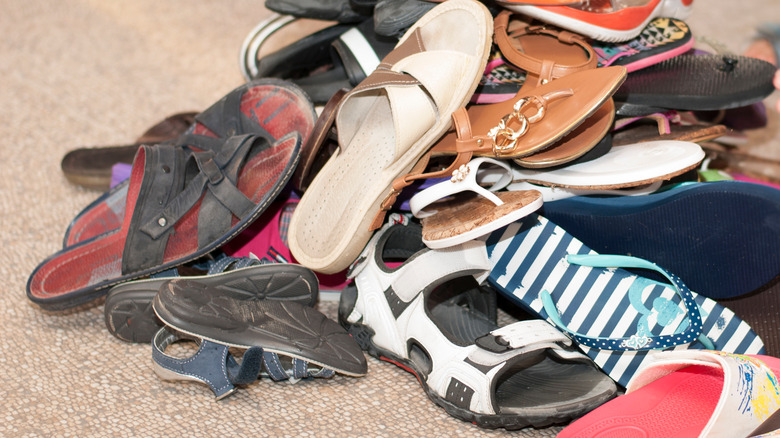 Pile of shoes on floor in home