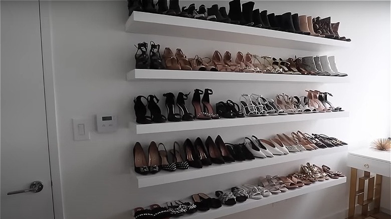 Shoe wall made from white IKEA LACK shelves