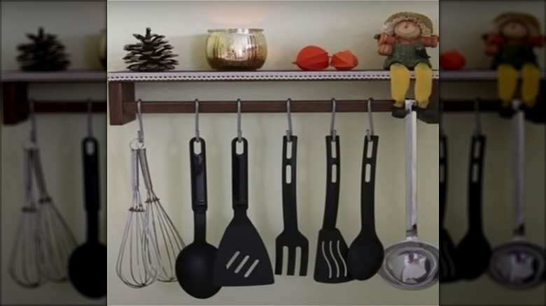 utensils hanging from rack