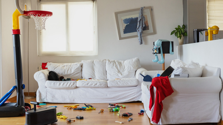 messy living room toys floor