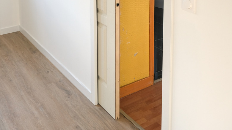 Bottom view of open pocket door