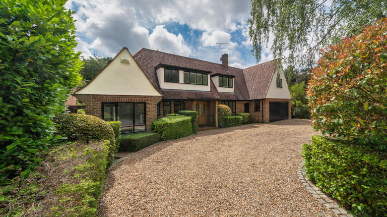 Home with gravel driveway