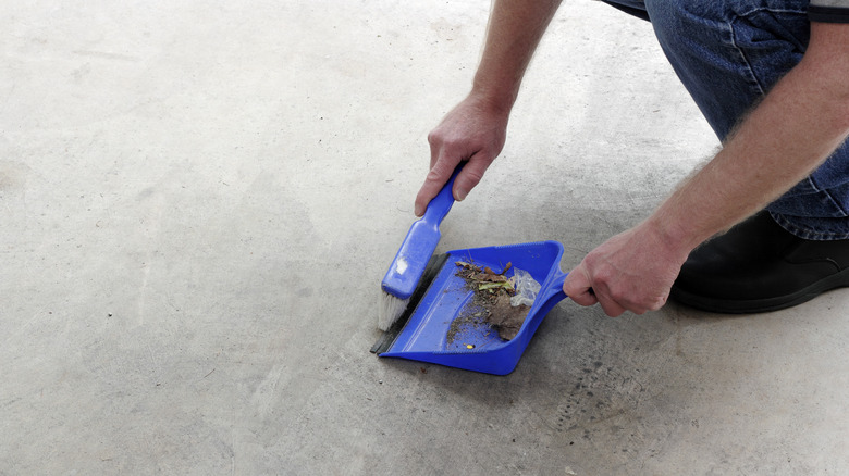 Sweeping up garage floor