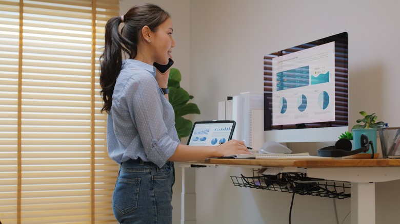 Woman working at standing desk