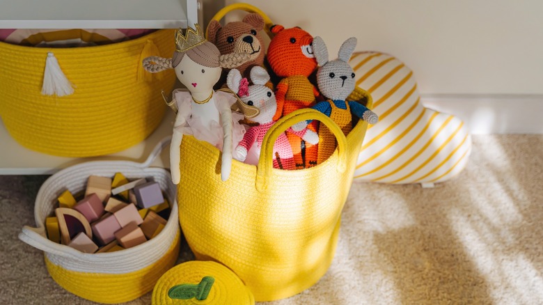 Toys in rope storage baskets