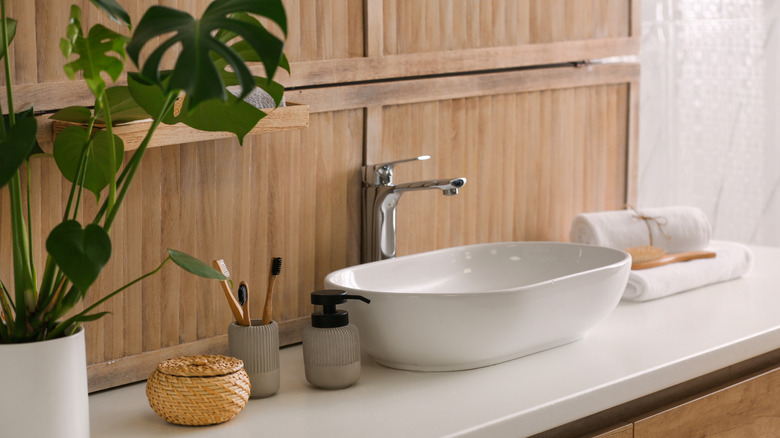 Bamboo wall behind bathroom sink