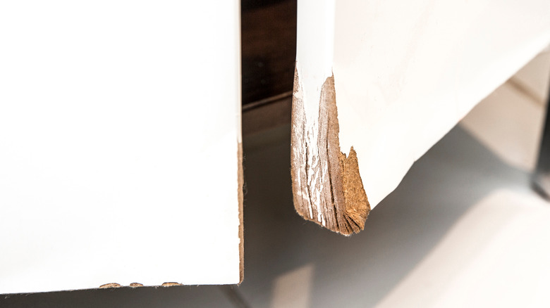 damaged melamine cabinet