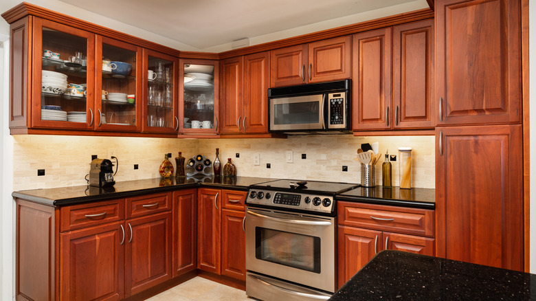 Outdated cherry finish cabinets