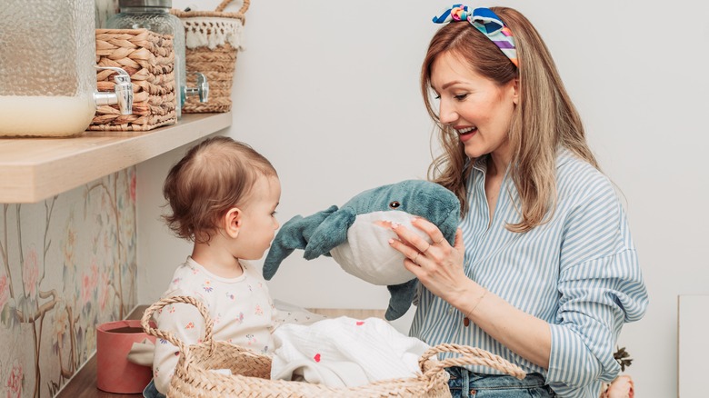 Mom with baby and stuffed toy