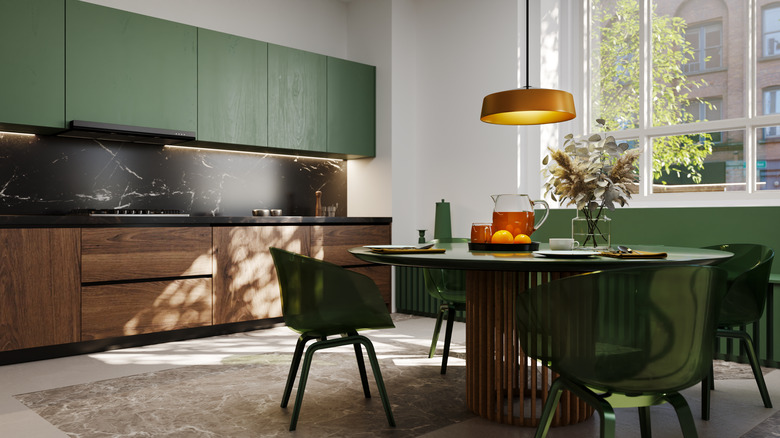 Kitchen with green moody color