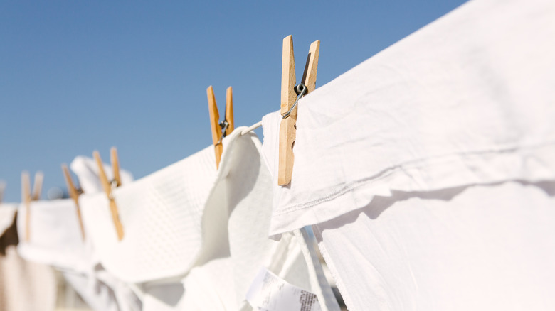 White clothes drying outside