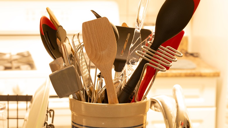 jar of assorted kitchen tools