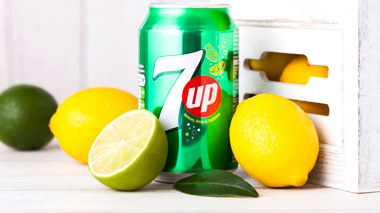 Can on 7UP with lemons and limes