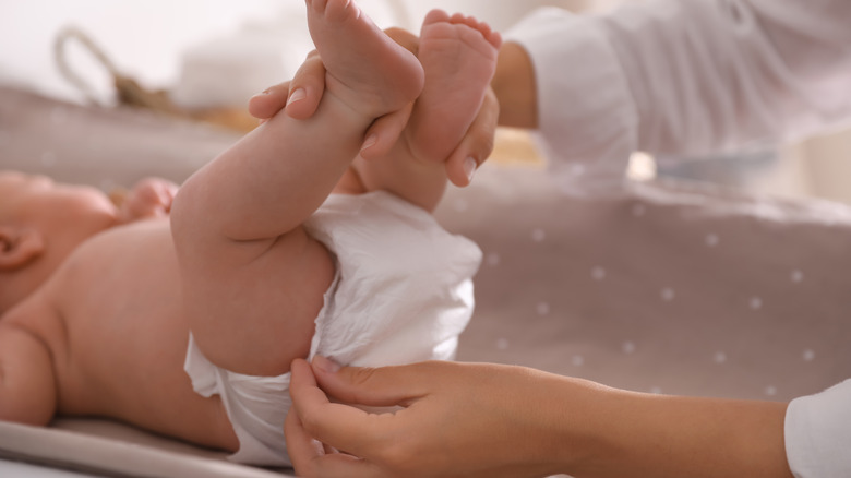 Baby on changing table