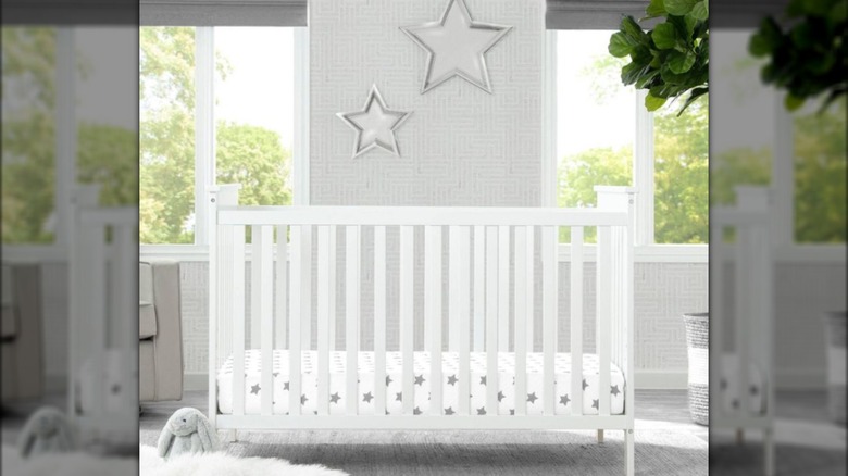 white crib with stars