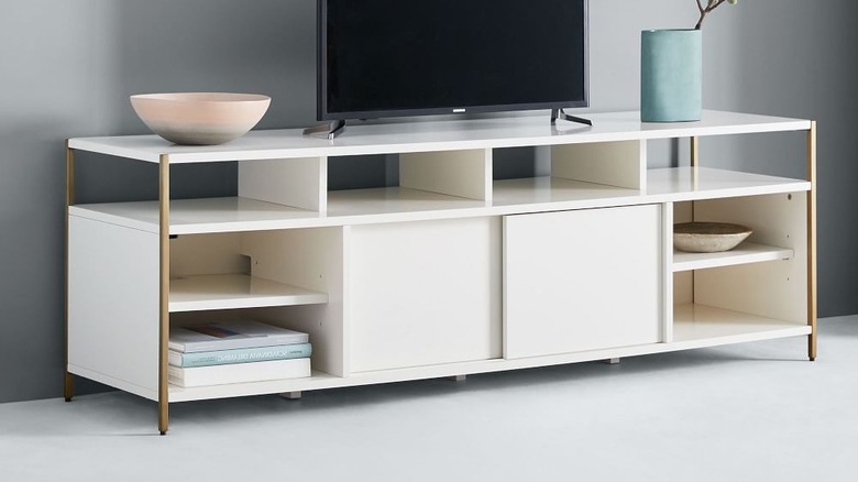 White media console gold hardware