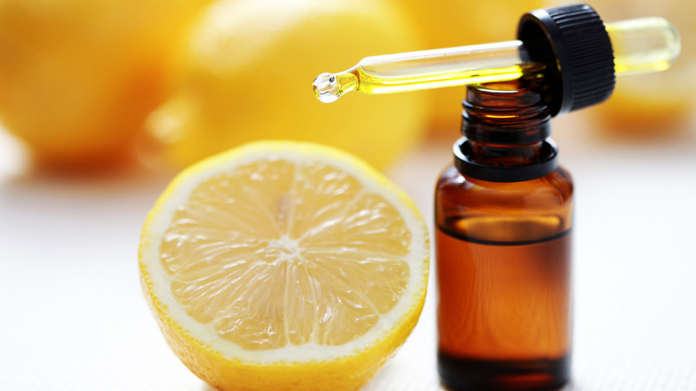 Lemon essential oil with lemon