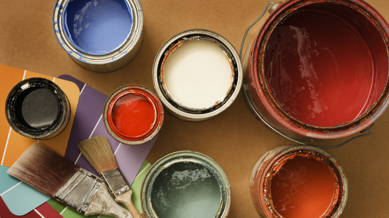 Paint tins and brushes